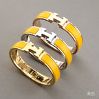 [Cyra]  H GELBES ARMBAND