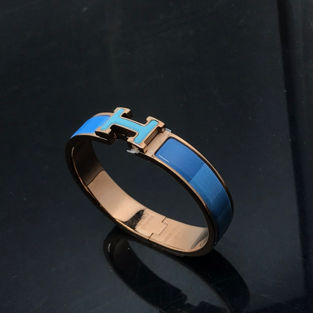 [Cyra] H ARMBAND BLAU REGENBOGEN KERAMIK