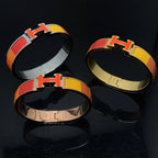 [Cyra] H-ARMBAND ORANGE REGENBOGEN KERAMIK