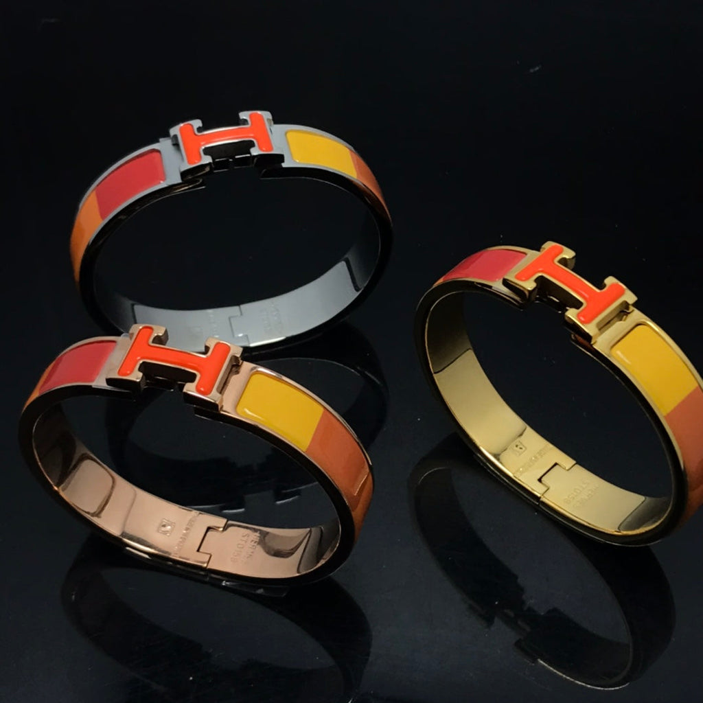 [Cyra] H-ARMBAND ORANGE REGENBOGEN KERAMIK