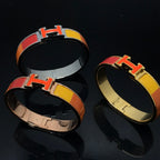 [Cyra] H-ARMBAND ORANGE REGENBOGEN KERAMIK