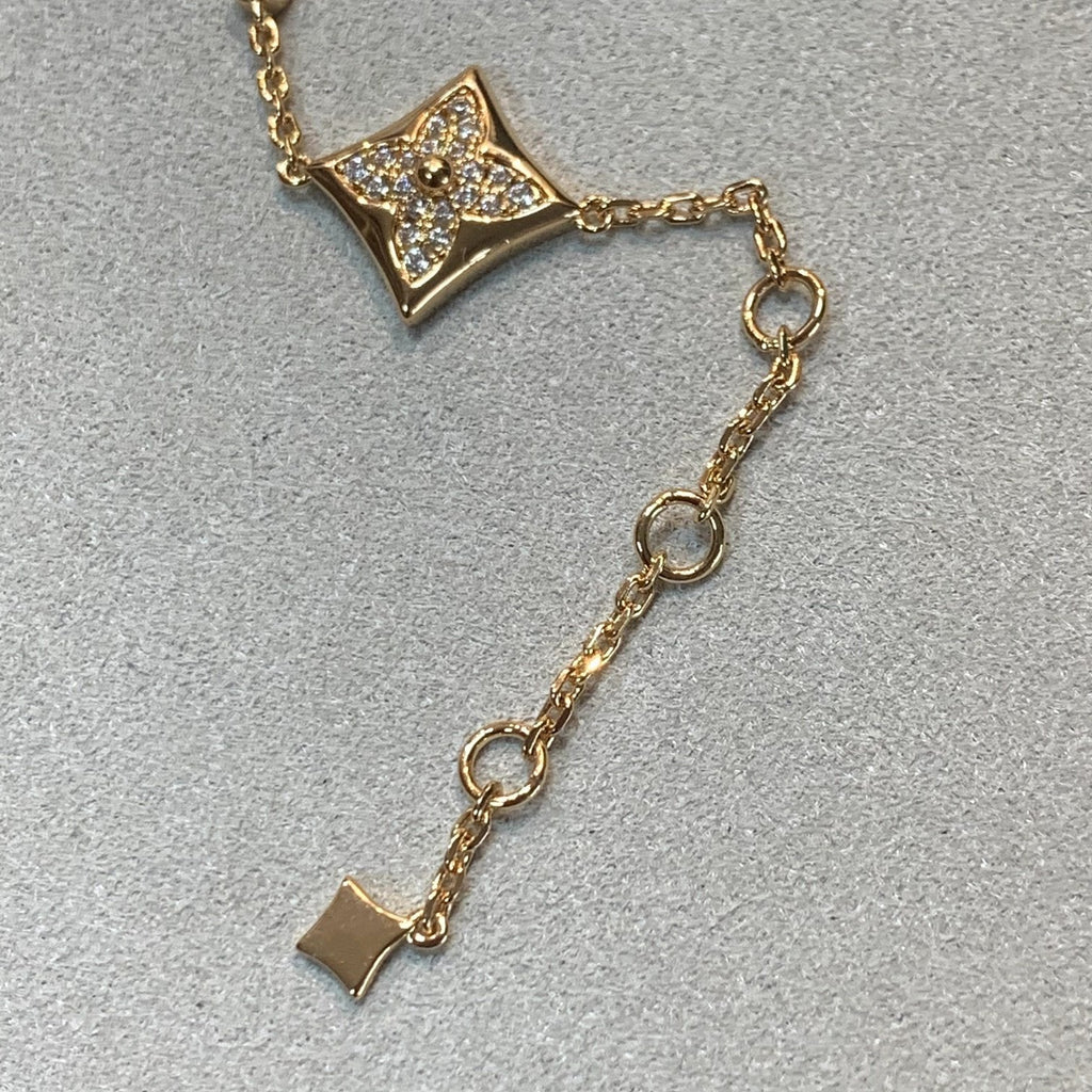 [Cyra]  STAR AND SUN 4 MOTIFS GOLD DIAMONDS BRACELET