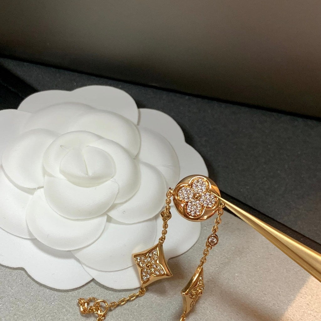 [Cyra]  STAR AND SUN 4 MOTIFS GOLD DIAMONDS BRACELET