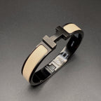 [Cyra] H ARMBAND 12MM SCHWARZ BEIGE KERAMIK