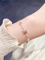 [Cyra]  STAR AND SUN 7 MOTIFS GOLD BRACELET