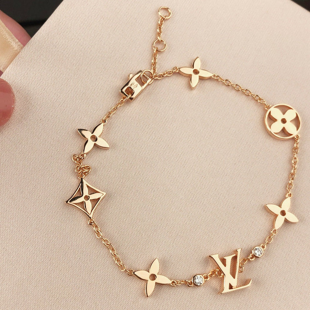 [Cyra]  STAR AND SUN 7 MOTIFS GOLD BRACELET
