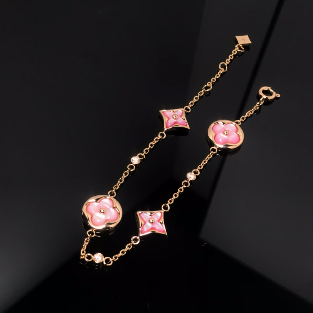 [Cyra]  STAR AND SUN 4 MOTIF PINK MOP PINK GOLD BRACELET