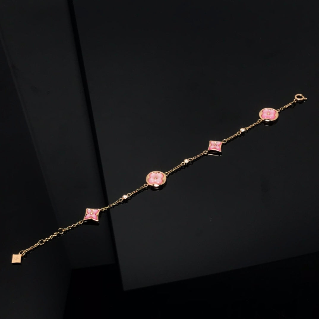 [Cyra]  STAR AND SUN 4 MOTIF PINK MOP PINK GOLD BRACELET
