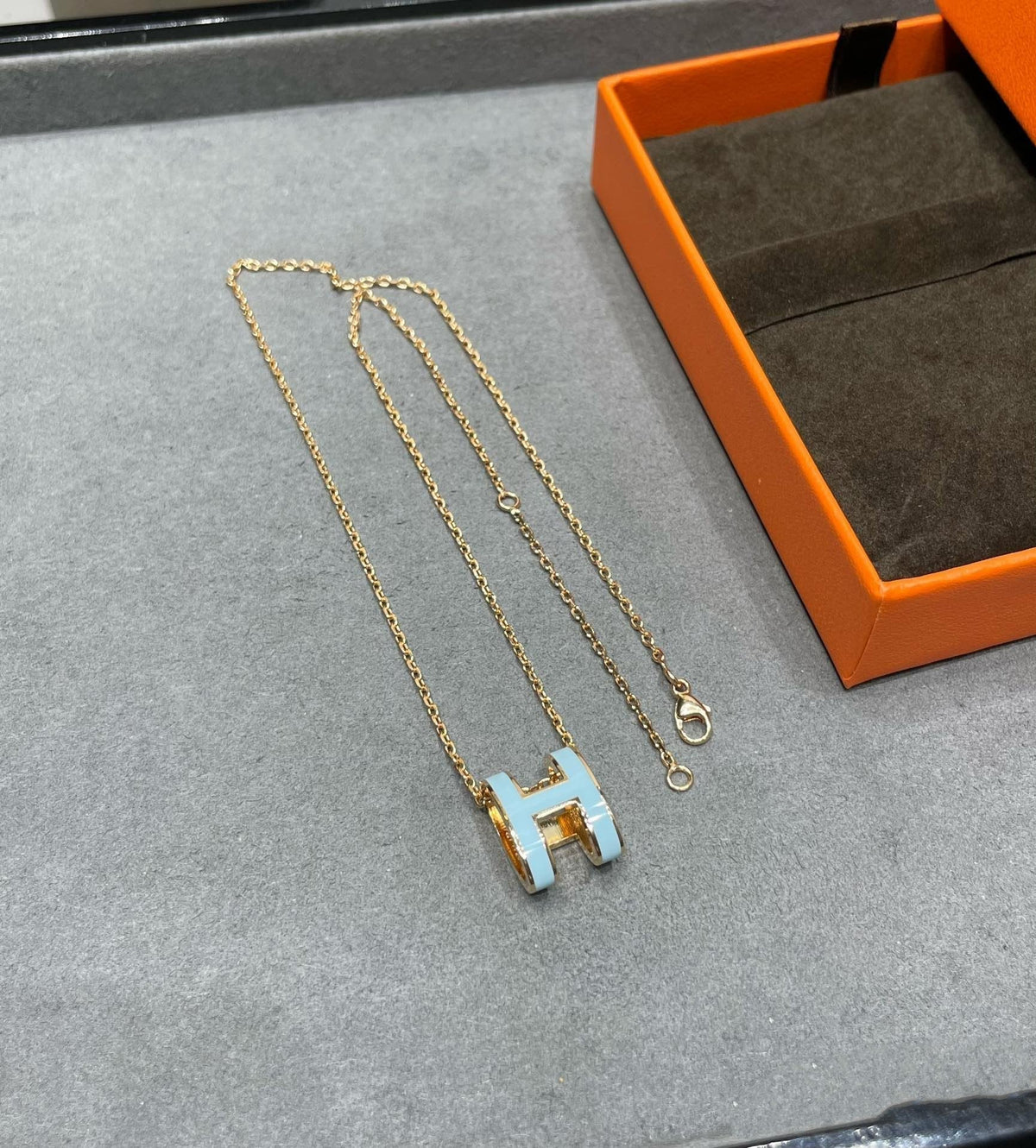 [Cyra]  POP H SKY BLUE NECKLACE
