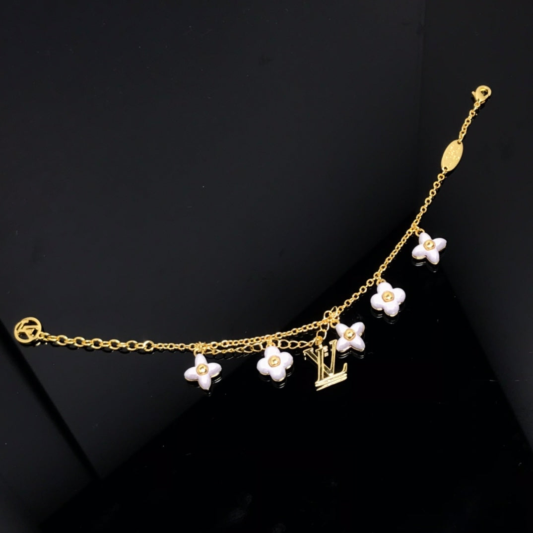 [Cyra]  LOGO 6 MOTIF STAR AND SUN GOLD BRACELET
