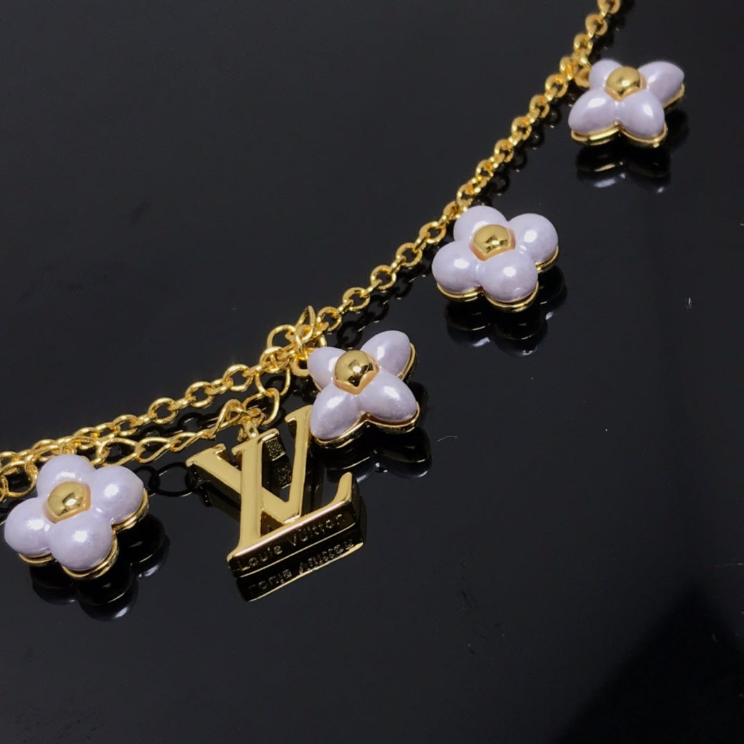 [Cyra]  LOGO 6 MOTIF STAR AND SUN GOLD BRACELET