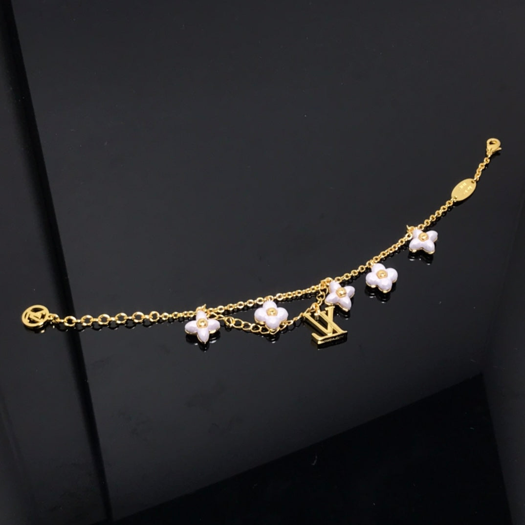 [Cyra]  LOGO 6 MOTIF STAR AND SUN GOLD BRACELET