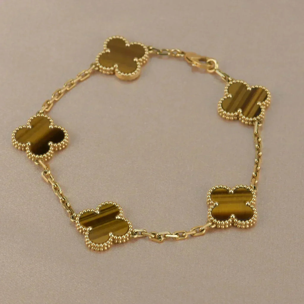{
  "Cyra": "Neue CLOVER 5 MOTIVE TIGERAUGE ARMBAND KOLLEKTION"
}