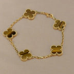 {
  "Cyra": "Neue CLOVER 5 MOTIVE TIGERAUGE ARMBAND KOLLEKTION"
}