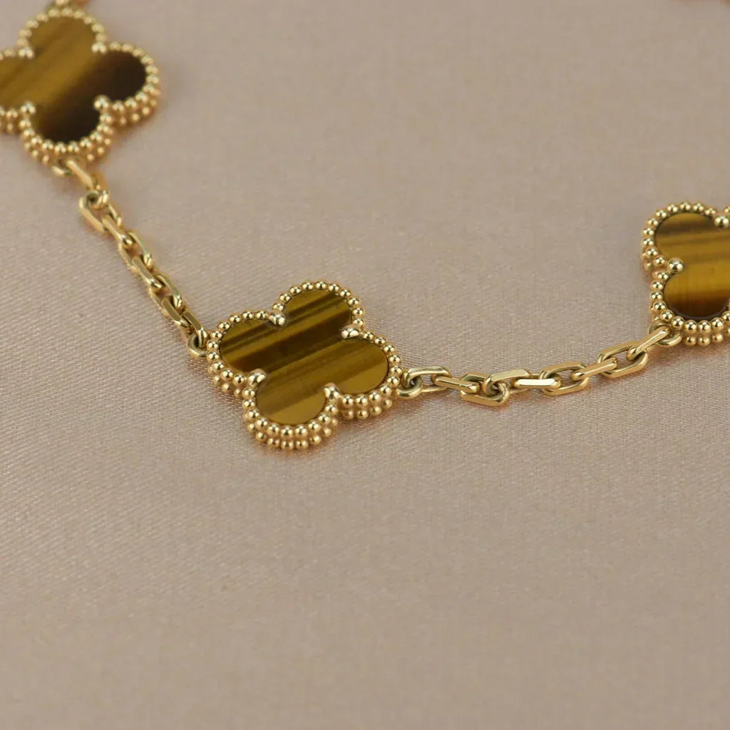 {
  "Cyra": "Neue CLOVER 5 MOTIVE TIGERAUGE ARMBAND KOLLEKTION"
}