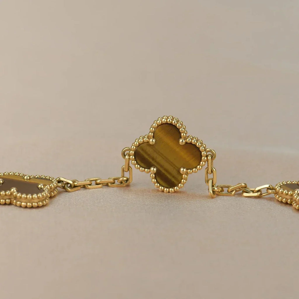 {
  "Cyra": "Neue CLOVER 5 MOTIVE TIGERAUGE ARMBAND KOLLEKTION"
}