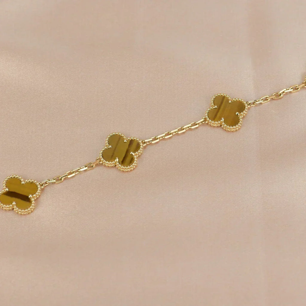 {
  "Cyra": "Neue CLOVER 5 MOTIVE TIGERAUGE ARMBAND KOLLEKTION"
}