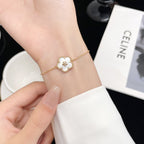 [Cyra]  LUCKY WHITE MOP PLUM BLOSSOM  BRACELET