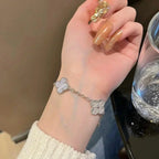 {
  "Cyra": "新作 クローバー 5モチーフ パープルカルセドニー ブレスレット コレクション"
}