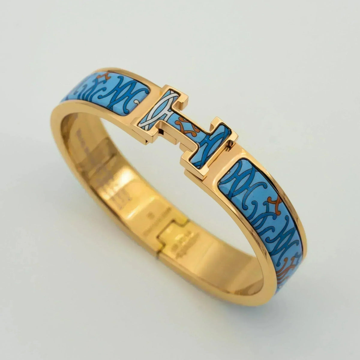 [Cyra] H-ARMBAND BLAU MEHRFARBIG