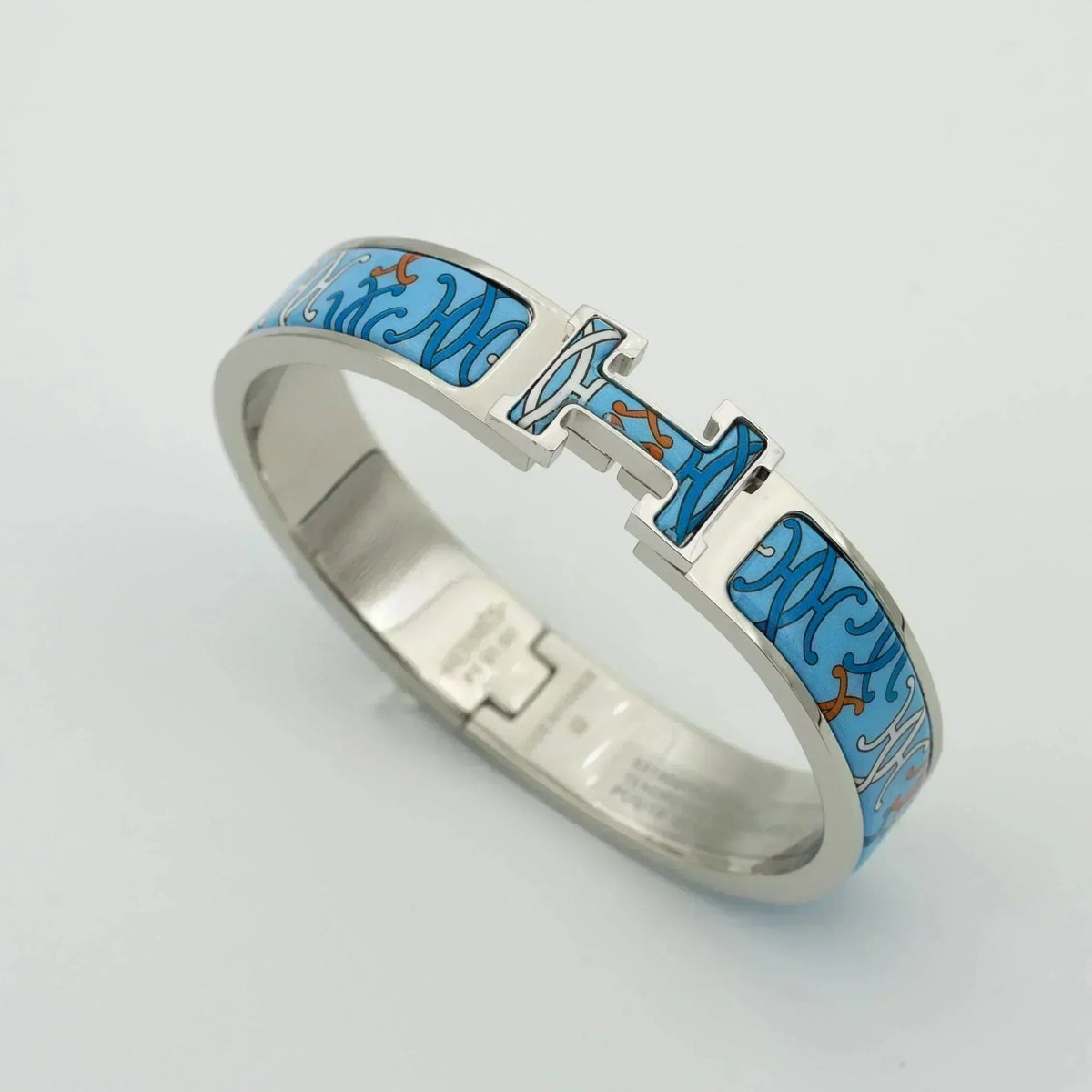 [Cyra] H-ARMBAND BLAU MEHRFARBIG