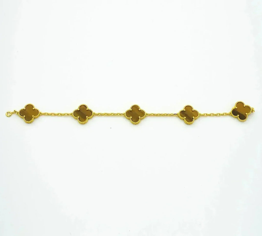 {
  "Cyra": "Neue CLOVER 5 MOTIVE TIGERAUGE ARMBAND KOLLEKTION"
}