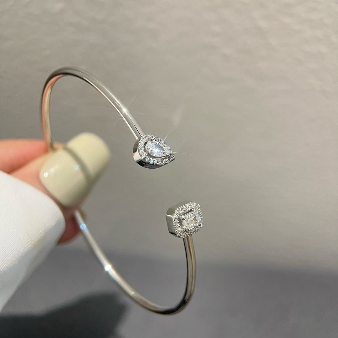 {
  "Cyra": "JONC FLEX MY TWIN TOI & MOI シルバー ダイヤモンド ブレスレット"
}