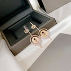 [Cyra]   MOVE ARROW OHRRINGE AUS ROSÉGOLD MIT DIAMANTEN