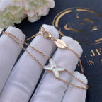 {
  "Cyra": "JEUX ARMBAND WEISSES PERLMUTT ROSÉGOLD 1 DIAMANT"
}