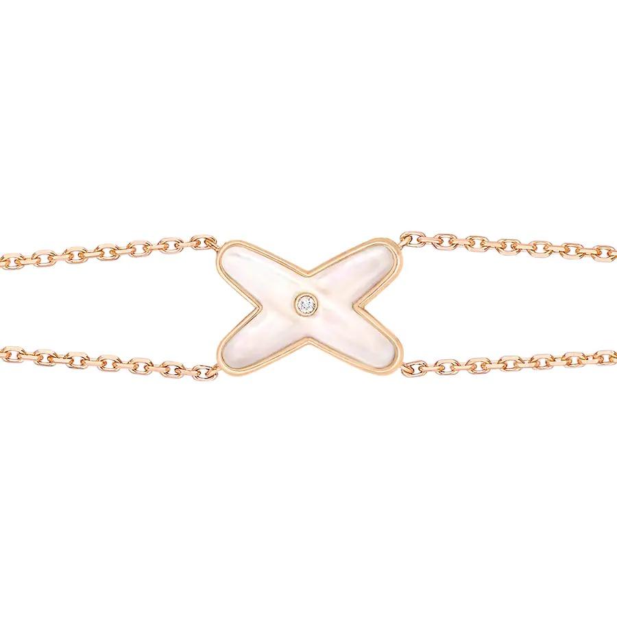 {
  "Cyra": "JEUX ARMBAND WEISSES PERLMUTT ROSÉGOLD 1 DIAMANT"
}
