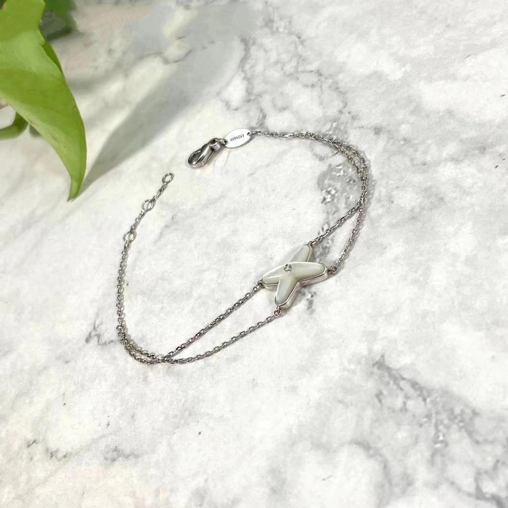[Cyra]  JEUX ARMBAND WEISSE PERLMUTT SILBER 1 DIAMANT