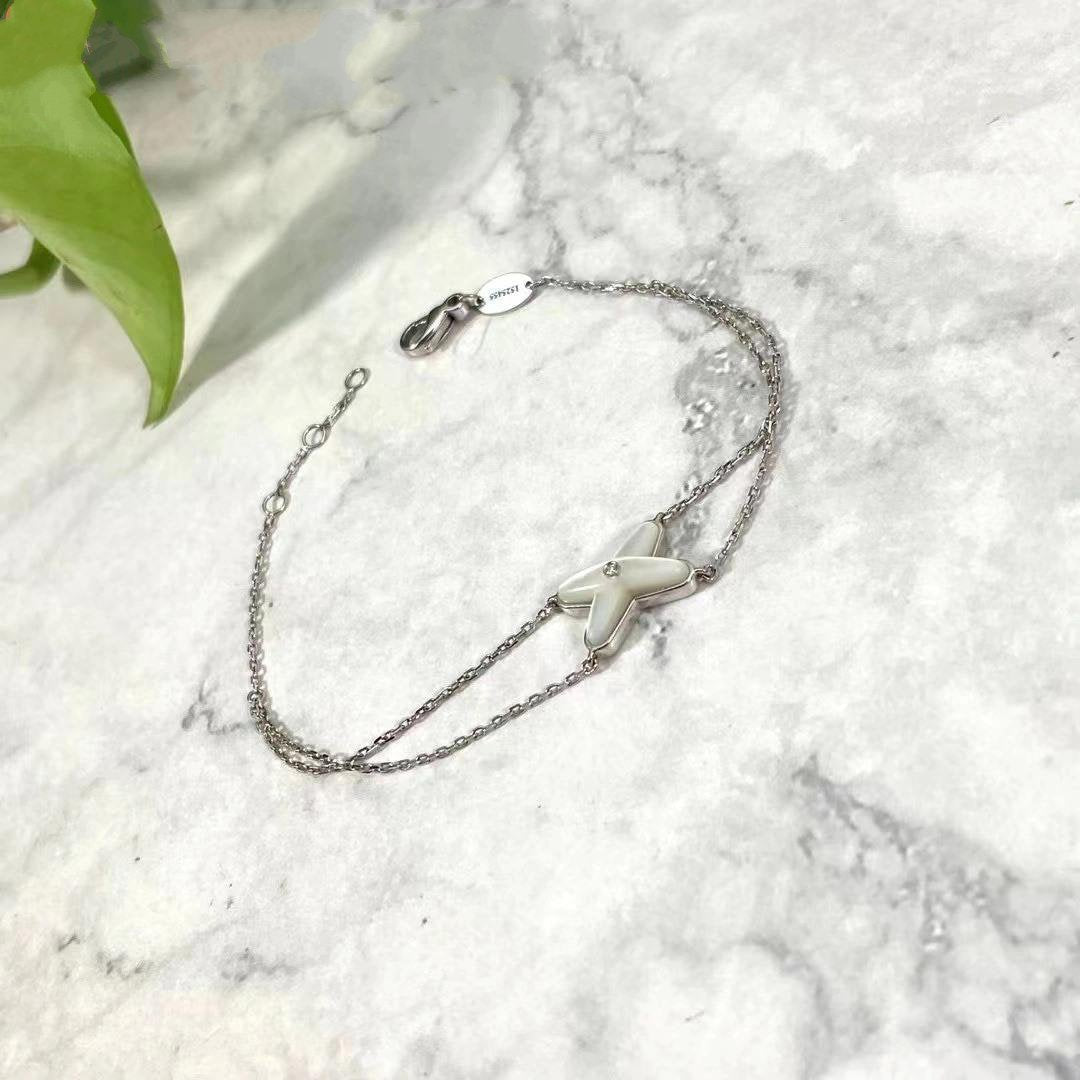 [Cyra]  JEUX ARMBAND WEISSE PERLMUTT SILBER 1 DIAMANT