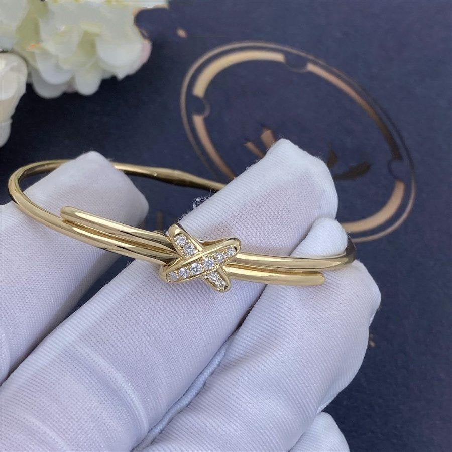 {
  "Cyra": "ARMBAND-SET GOLD DIAMANTEN"
}