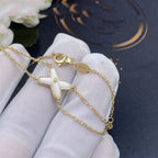 [Cyra]  JEUX ARMBAND WEISSE PERLMUTT GOLD 1 DIAMANT