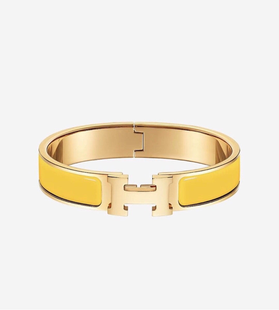 [Cyra]  H GELBES ARMBAND